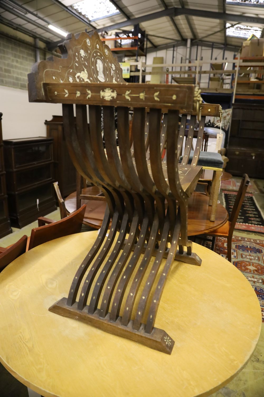 An Italian bone inlaid Savonarola chair, width 72cm